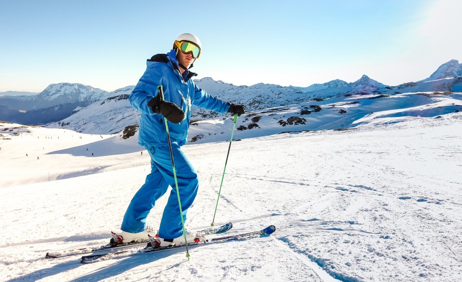 man hitting the slopes