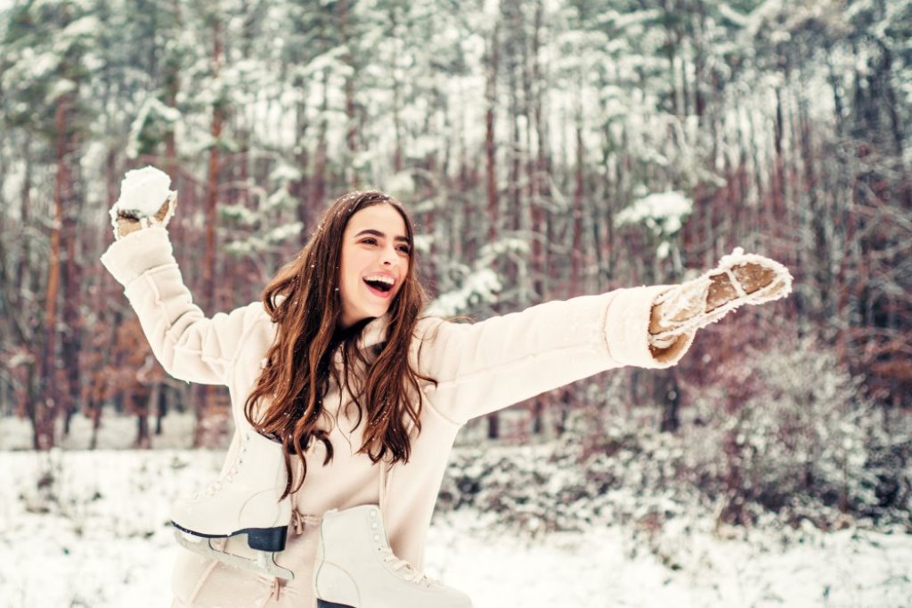 woman about to throw a snowball